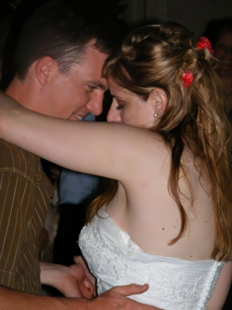 Adoption Profile Photo. Jessica and Nathan dancing together on their wedding day