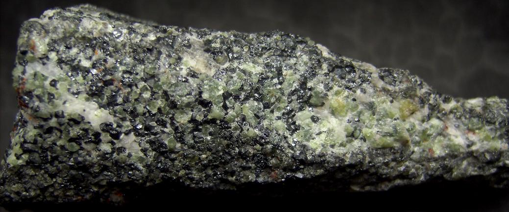 fluorescent green WILLEMITE, FRANKLINITE, CALCITE, ZINCITE - Franklin Mine, Franklin, Franklin Mining District, Sussex County, New Jersey, USA - Franklinite and Zincite type locality