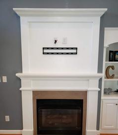 Custom Fireplace Niche Cover up with tv mounted, Carolina Custom Mounts