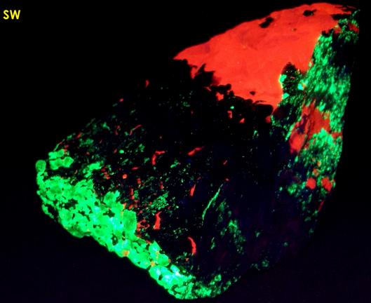 fluorescing CALCITE, WILLEMITE with FRANKLINITE, ZINCITE - Sterling Mine, Sterling Hill, Ogdensburg, Franklin Mining District, Sussex County, New Jersey, USA - type locality