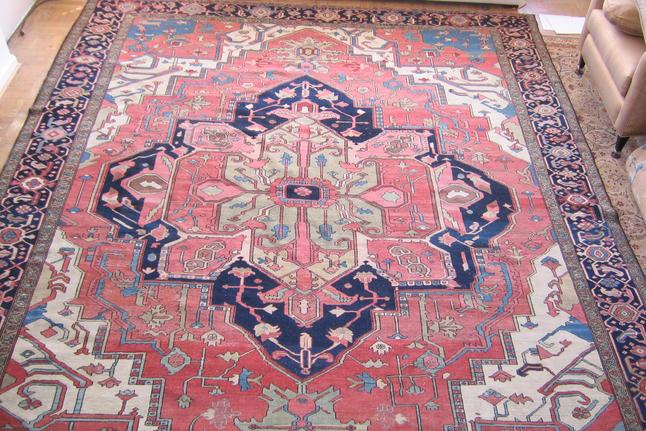 At Auction: ANTIQUE HERIZ SCATTER RUG