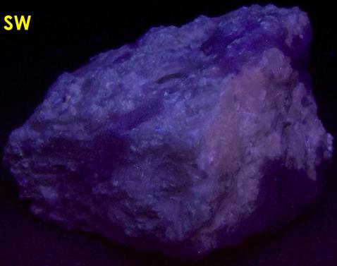 fluorescent phosphorescent white Wollastonite, blue Calcite- Gouverneur Talc Company No. 4 Quarry (Valentine deposit), Harrisville, Diana Township, Lewis County, New York