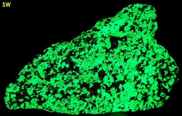 fluorescent WILLEMITE, red ZINCITE, black FRANKLINITE - Franklin Mine, Franklin, Franklin Mining District, Sussex County, New Jersey, USA, type locale, gneiss ore