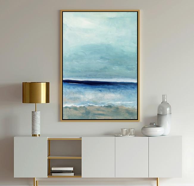 Blue Art ocean seascape in light blue and white which shows calm ocean water and clouds in the sky.