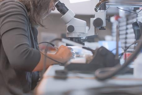 microscope woman design engineering development