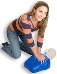 Image of young female practicing CPR on blue training mannequin