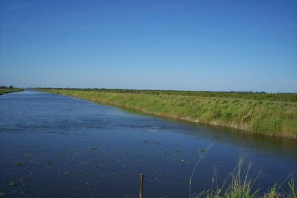 St Johns Improvement District primary canal (flowway) with a clear blue sky