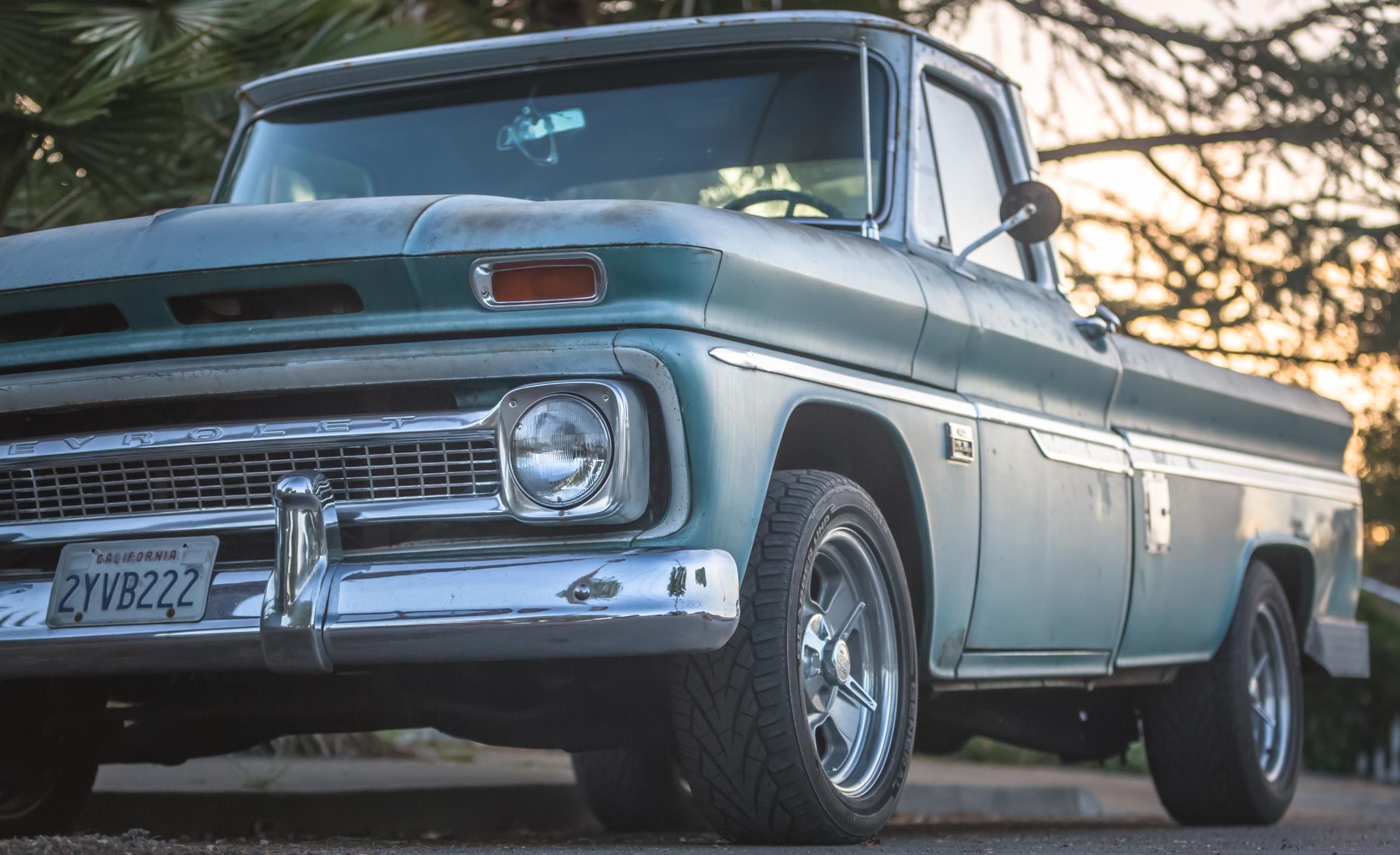 vintage chevy truck green and chrome sunset