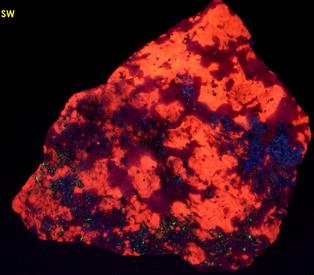 Crazy Calcite - fluorescent DOLOMITE, CALCITE, ARAGONITE, phosphorescent WILLEMITE, DIOPSIDE, FRANKLINITE, ZINCITEFranklin, Franklin Mining District, Sussex County, New Jersey, USA