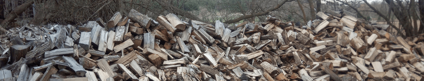Offloading firewood bags at Fortinos with the machine