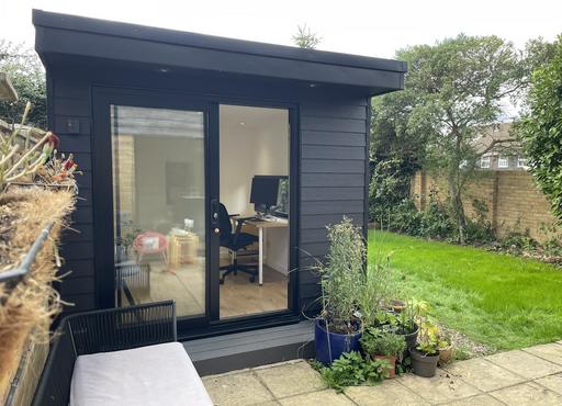 Large modern garden room with pool table and bar