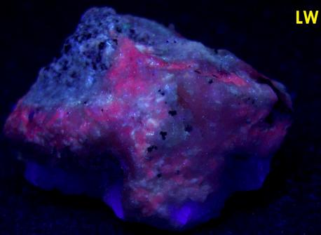 fluorescent FLUORITE on CALCITE with PYRITE, Huanzala Mine, Huallanca District, Bolognesi Province, Ancash Department, Peru