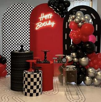 BLACK & RED RACETRACK BACKDROP & PEDESTAL COVERS FOR RENT