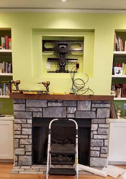 Dynamic Mounting fireplace pull down mount installation company in charlotte nc, this is what the down and out mount looks like before flat screen tv is put on it, Charlotte TV over fireplace mounters in charlotte nc