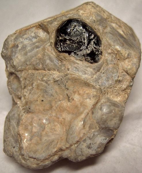 APACHE TEARS OBSIDIAN in perlite - Apache Tears locality, Picketpost Mountain area, Superior, Pinal County, Arizona, USA