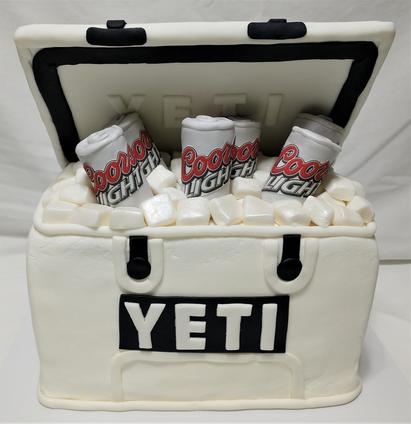 Yeti Cooler shaped grooms cake with cans and logos