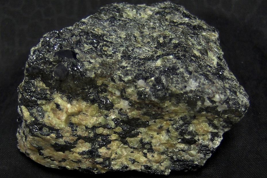 FRANKLINITE, fluorescing WILLEMITE, CALCITE - Sterling Mine, Sterling Hill, Ogdensburg, Franklin Mining District, Sussex County, New Jersey, USA - Franklinite type locality