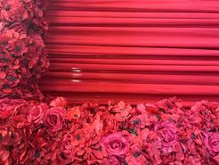red flower arch backdrop