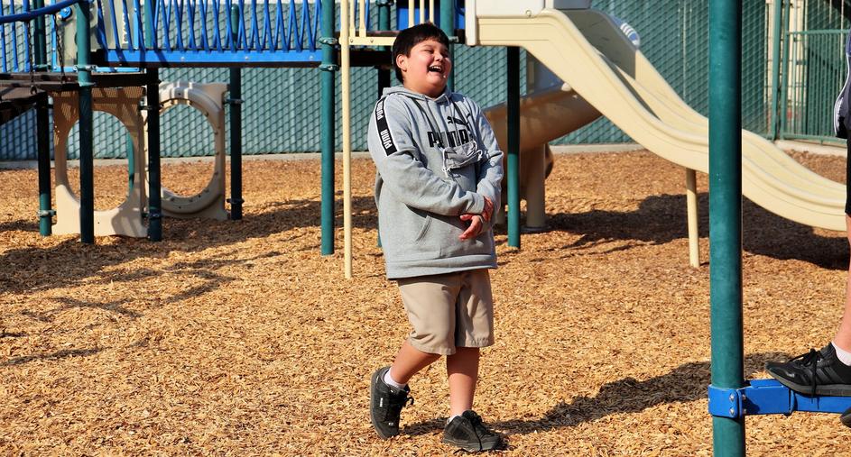 Boy Laughing at private Catholic school in Hanford