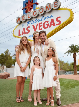 French Wedding Couple getting married at the Welcome to Las Vegas Sign