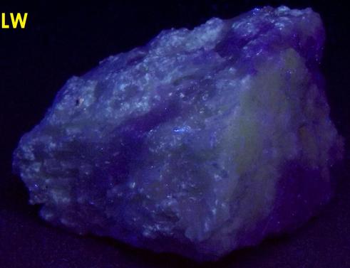 fluorescent phosphorescent white Wollastonite, blue Calcite- Gouverneur Talc Company No. 4 Quarry (Valentine deposit), Harrisville, Diana Township, Lewis County, New York