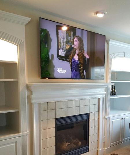 Flat Screen TV over Fireplace Mounting Company in Charlotte NC, Best TV mounting service in Charlotte, Fort Mill, Waxhaw, Monroe, and Rock Hill