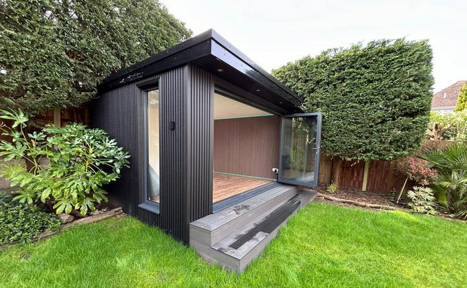 Large modern garden room with pool table and bar