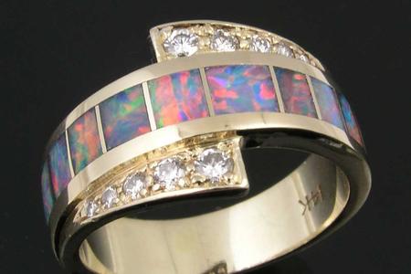 Diamond and opal ring repaired by Hileman.