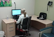 Image of a women working at a desk