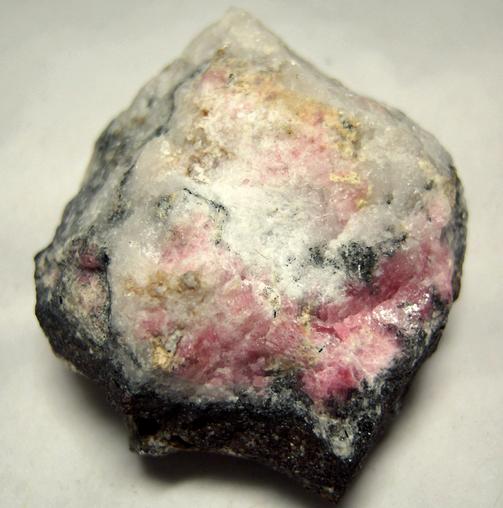 fluorescent TUGTUPITE with AEGIRINE - Ilimaussaq complex, Narsaq, Kujalleq (Kitaa Province - West Greenland), Greenland, Denmark - type locality