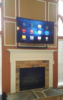 Charlotte HD TV Installers for fireplace tv mounting and wall mounting.  Professional TV mounting service