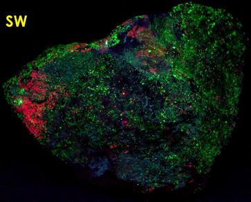fluorescent SPHALERITE Cleiophane, WILLEMITE, MAGNETITE, HYDROZINCITE, CALCITE,Taylor Road site, Franklin, Franklin Mining District, Sussex County, New Jersey, USA