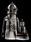 retro robot sculpture art astronaut