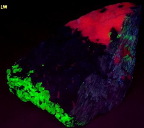 fluorescing CALCITE, WILLEMITE with FRANKLINITE, ZINCITE - Sterling Mine, Sterling Hill, Ogdensburg, Franklin Mining District, Sussex County, New Jersey, USA - type locality