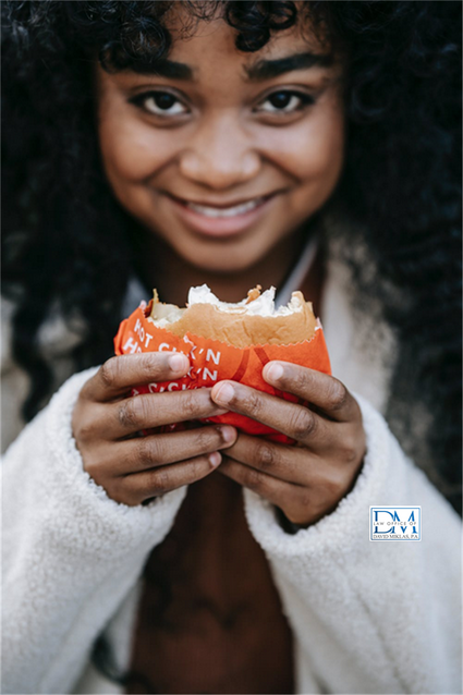 black people eating chicken