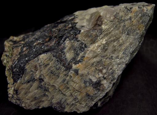 fluorescing CALCITE, WILLEMITE with FRANKLINITE, ZINCITE - Sterling Mine, Sterling Hill, Ogdensburg, Franklin Mining District, Sussex County, New Jersey, USA - type locality