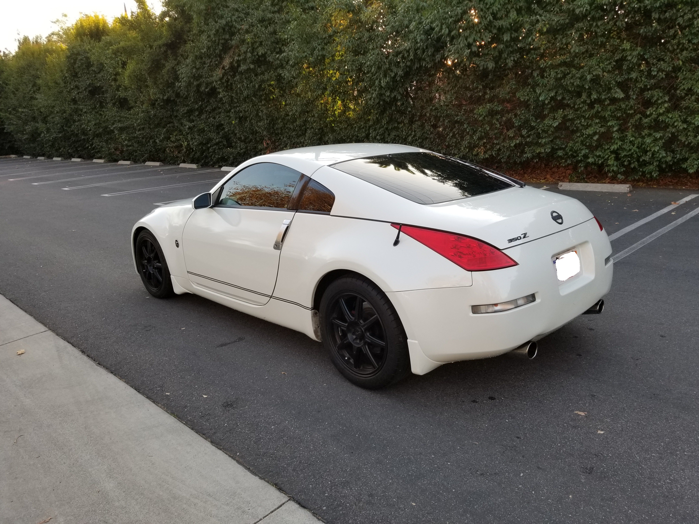 2006 Nissan 350Z Black Coupe, image size:1440x1080