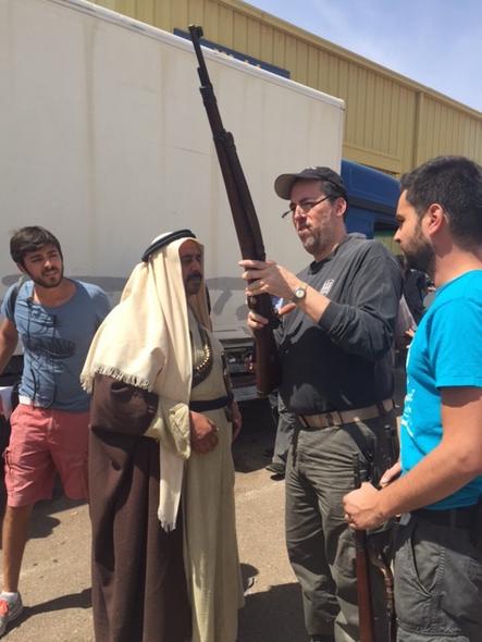 Jay Lance and arab soldier clearing a weapon