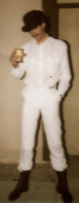 A Clockwork Orange costume with glass of milk