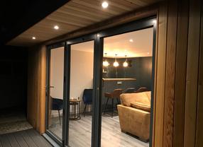 Modern cedar clad garden room with bespoke bar in Leigh-on-Sea, Essex built by Robertson Garden Rooms