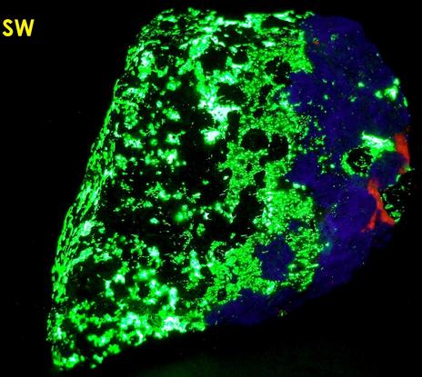 fluorescing Hardystonite, Willemite, Calcite, black Franklinite, brown Zn-Diopside Zinc Schefferite - Franklin Mine, Franklin, Franklin Mining District, Sussex County, New Jersey - type locality