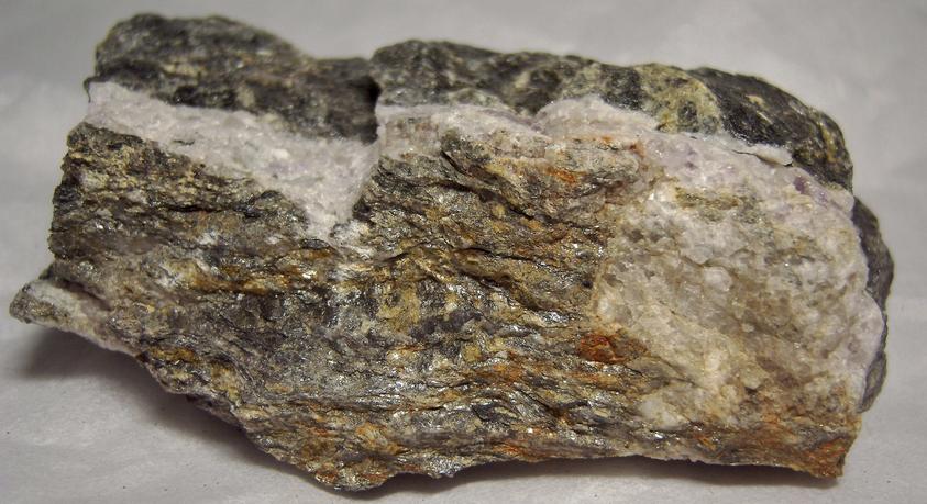 fluorescing FLUORITE, CALCITE, PYRITE with MUSCOVITE - Thomaston Dam railroad cut, Thomaston, Litchfield County, Connecticut, USA - for sale