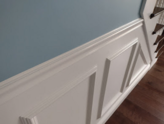 Perfectly painted dining room wainscoting.