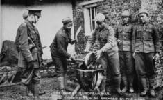 Gurkha soldiers sharpening their kukris in the First World War