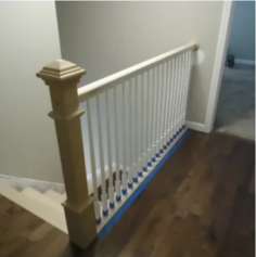 Staircase banister before painting and staining.