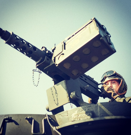 Tank crewman manning a .50 cal machine gun