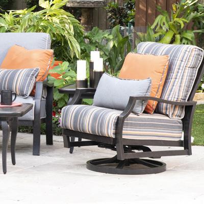 Mallin Palisades patio sets with grey and oranga striped sunbrella cushions