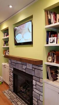flat screen tv mounted over fireplace by charlotte nc best tv mounting service, carolina custom mounts