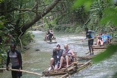 "Uncover Jamaica's secrets with this comprehensive tour, exploring Green Grotto's limestone formations, Calypso Rafting's tranquil scenery and Luminious Lagoon's bioluminescent wonders"