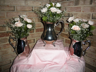 Silver teapot vases with babies breath for rent at Rent Your Event, LLC.